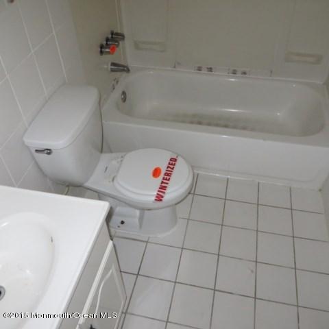 216 Sawmill Road Brick, NJ 08724 - Photo 9 of 11 a bathroom with a bathtub and next to a shower