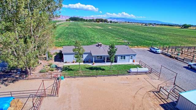a view of a house with a big yard