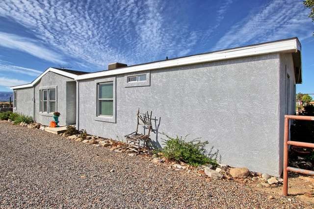 2135 M Road Grand Junction, CO 81505 - Photo 13 of 42 a front view of a house with garden