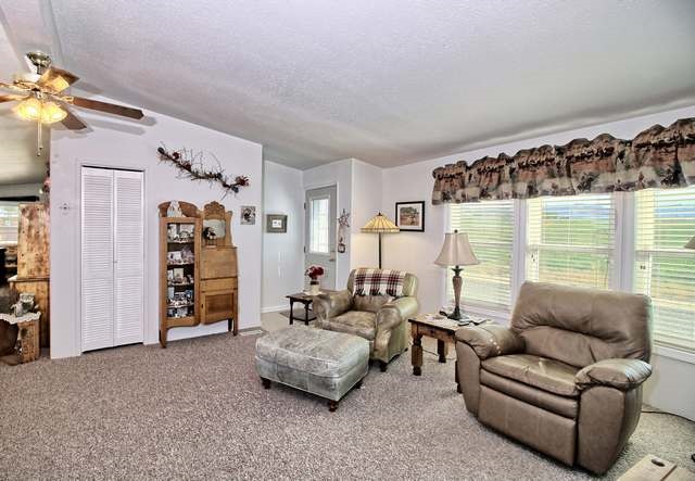 2135 M Road Grand Junction, CO 81505 - Photo 29 of 42 a living room with furniture and a large window