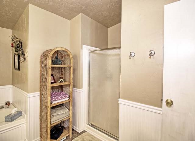 2135 M Road Grand Junction, CO 81505 - Photo 41 of 42 a view of walk in closet with clothes and shoes