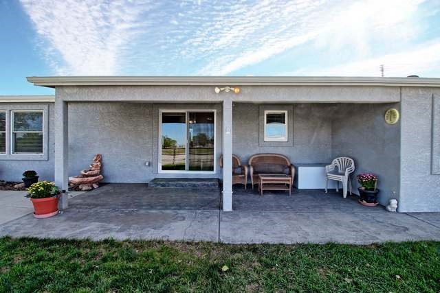 2135 M Road Grand Junction, CO 81505 - Photo 9 of 42 a front view of a house with patio
