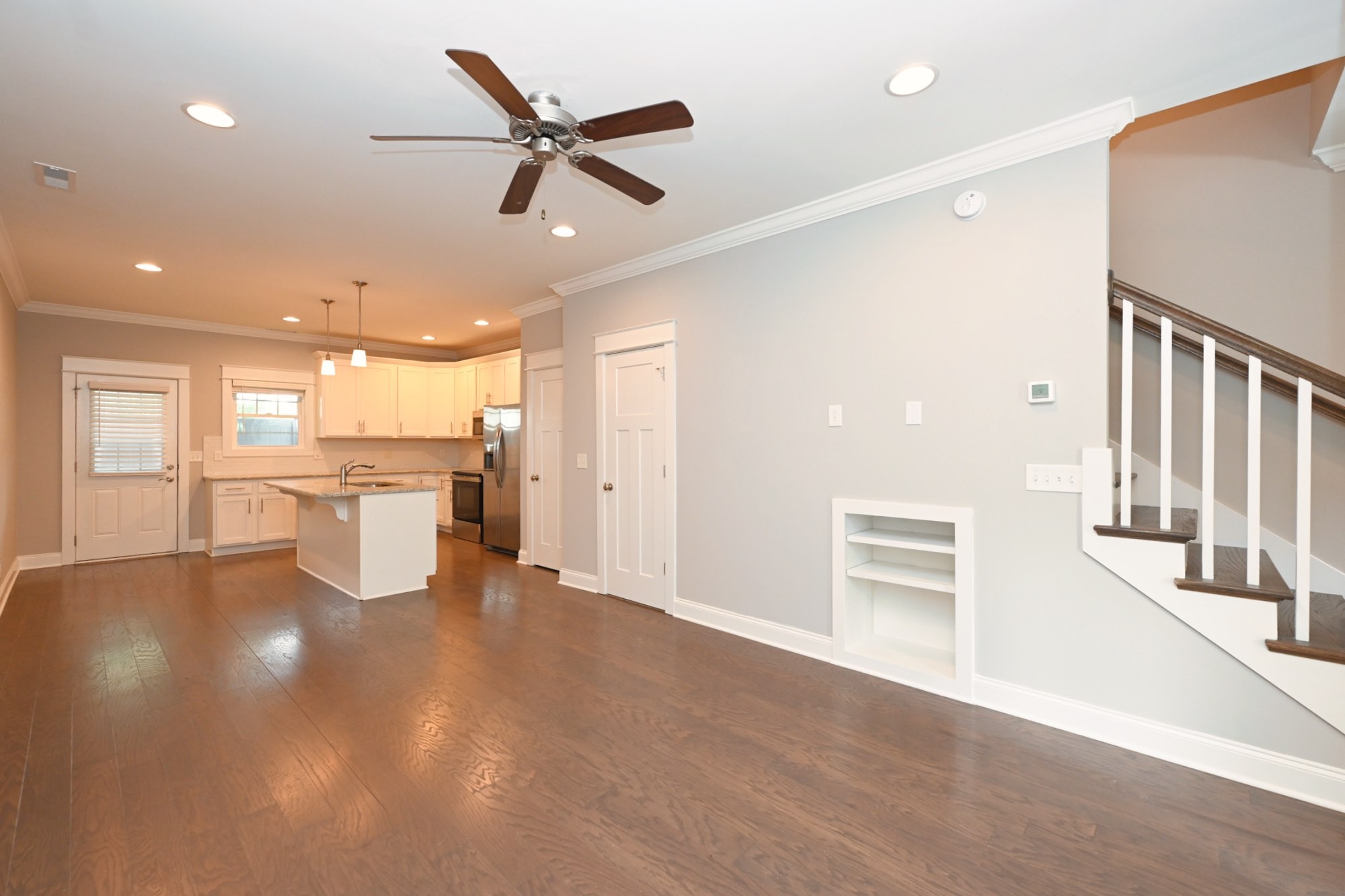 1019 North Maple Street, Unit 2D Murfreesboro, TN 37130 - Photo 15 of 56 a view of a livingroom with a ceiling fan