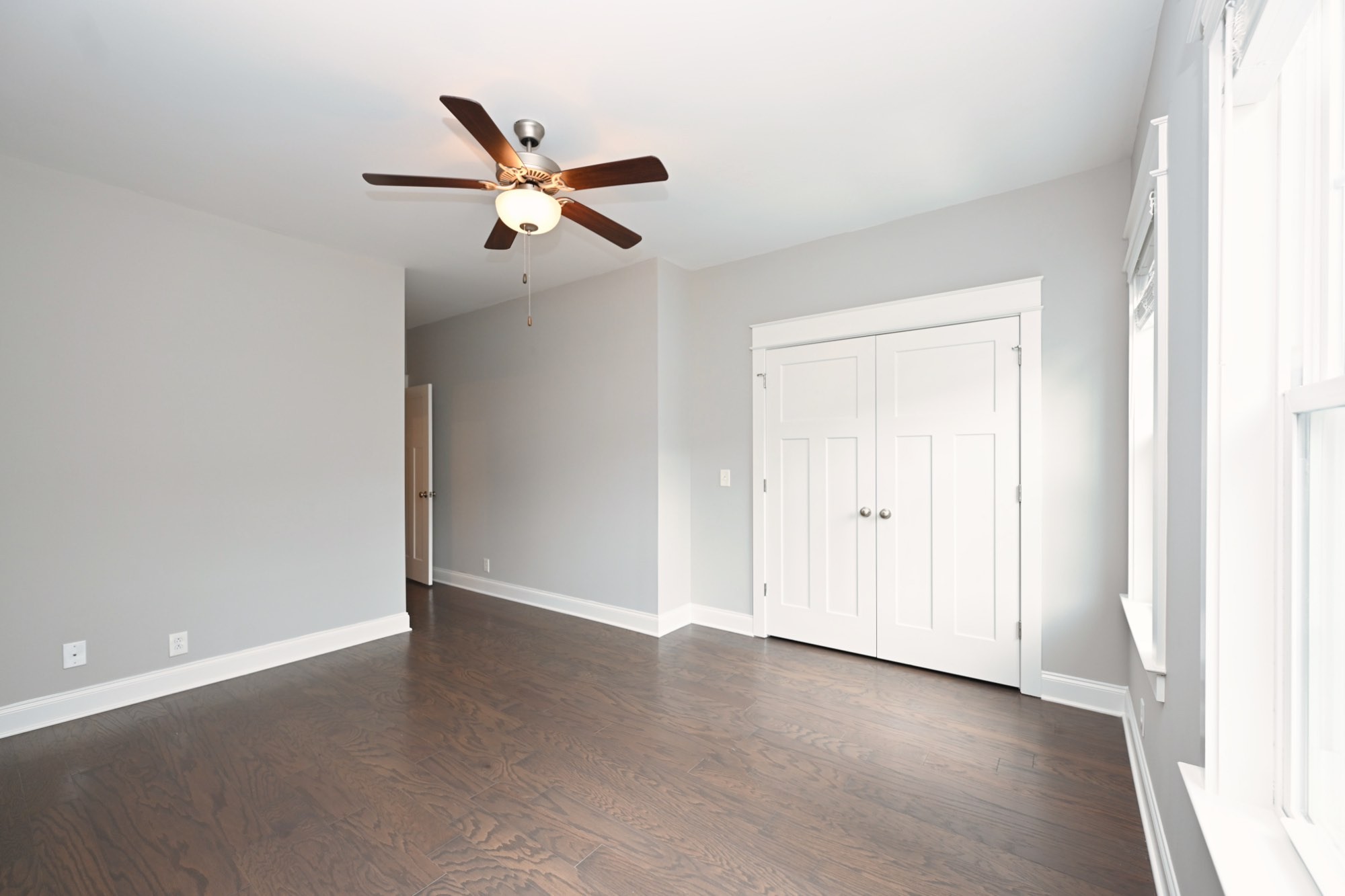 1019 North Maple Street, Unit 2D Murfreesboro, TN 37130 - Photo 35 of 56 a view of a livingroom with a ceiling fan and window