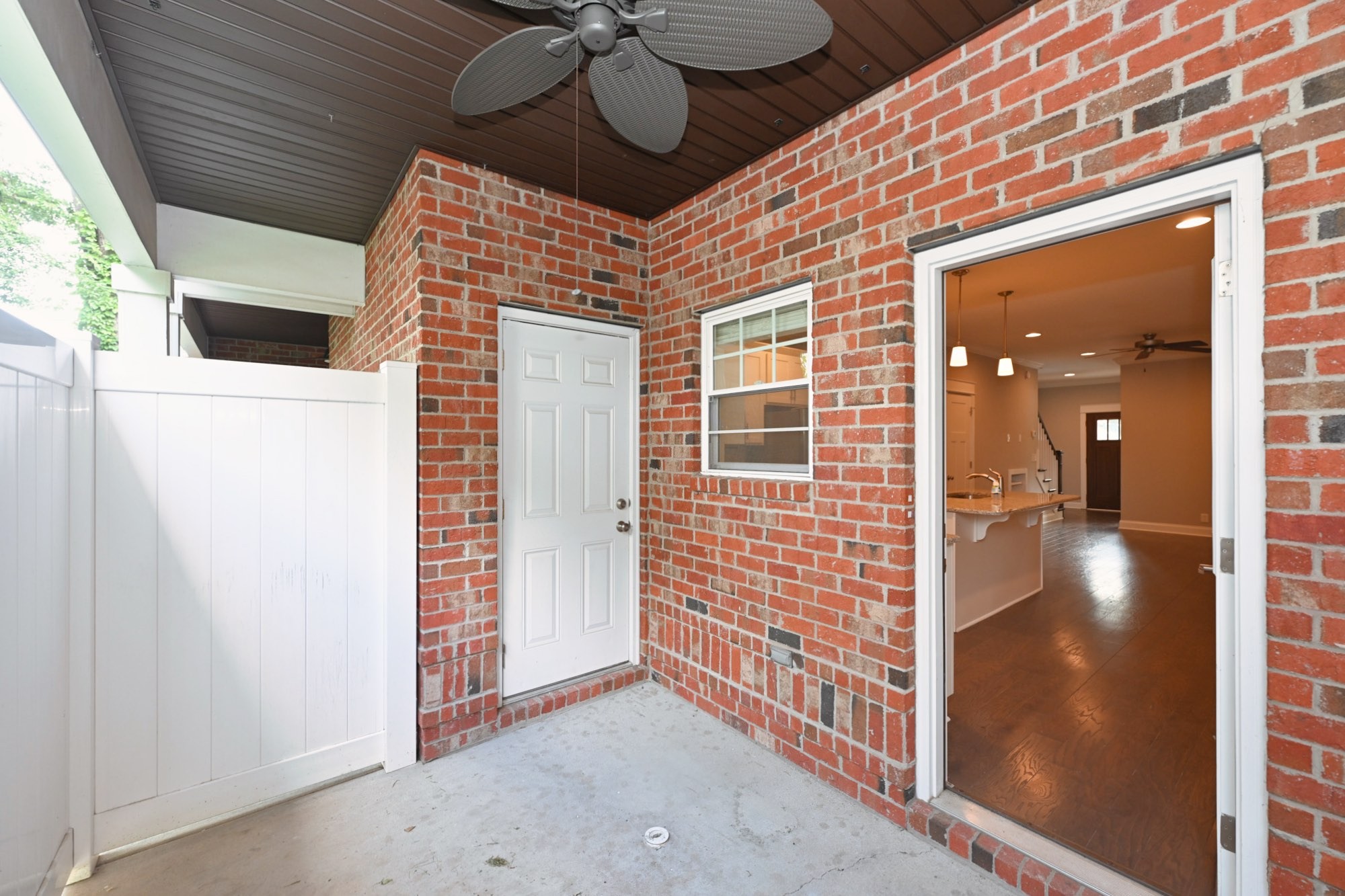 1019 North Maple Street, Unit 2D Murfreesboro, TN 37130 - Photo 43 of 56 a view of a porch with a table and chairs