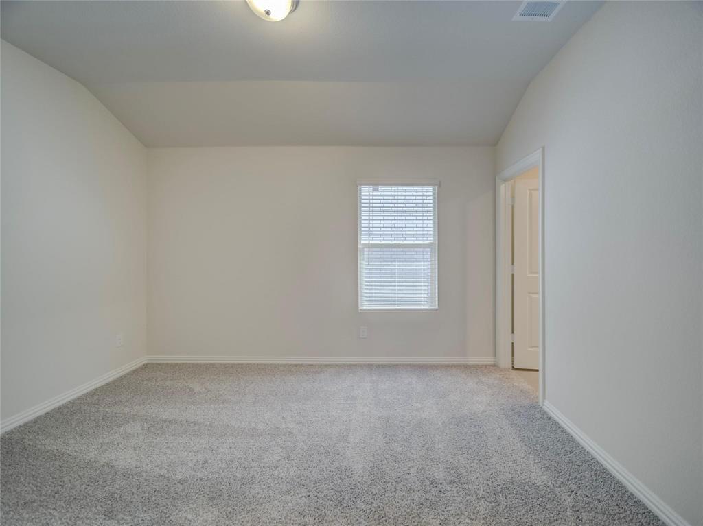 3405 Kingsgarden Road Denton, TX 76207 - Photo 20 of 37 an empty room with a window
