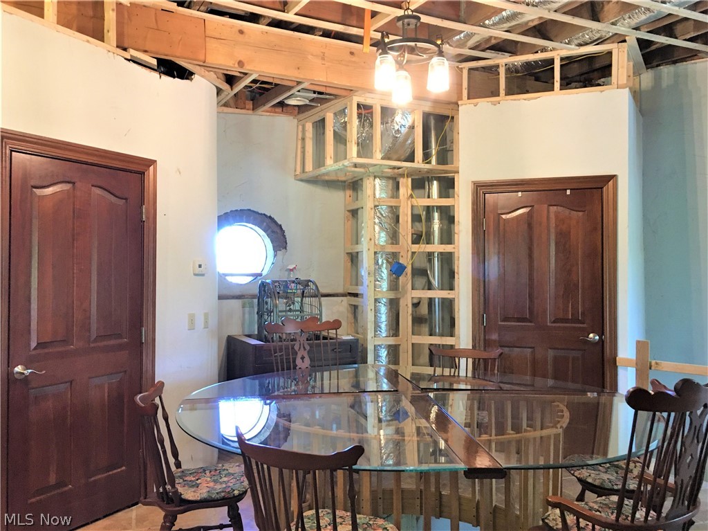4630 Kolbe Road Lorain, OH 44053 - Photo 13 of 35 New heat runs and new ceiling beams ready for new drywall.