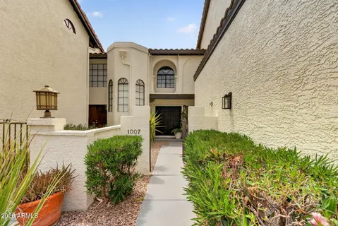 a front view of a house with glass windows