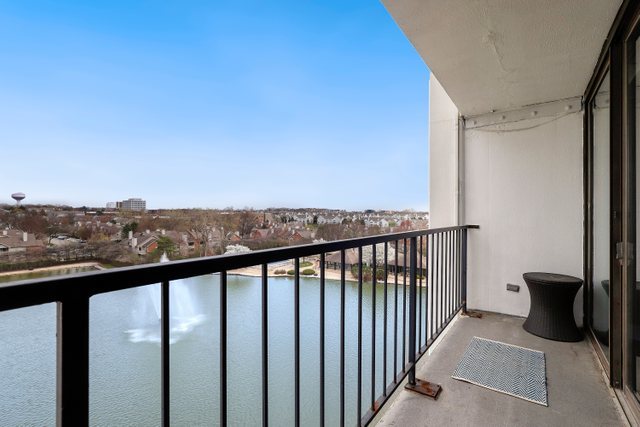 2005 South Finley Road, Unit 703 Lombard, IL 60148 - Photo 21 of 30 a view of a balcony with an outdoor seating