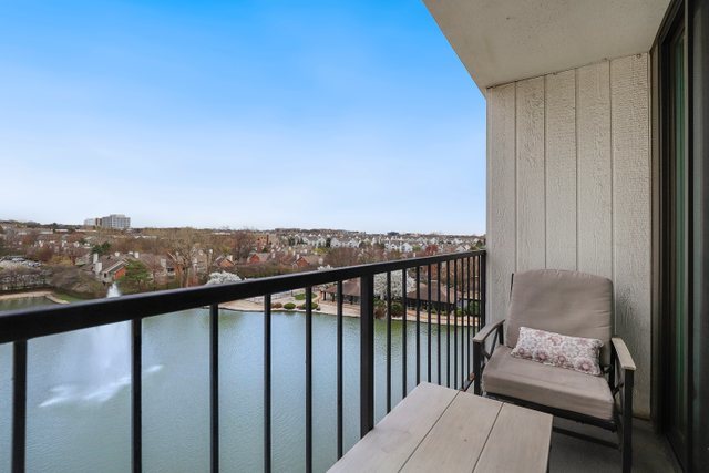 2005 South Finley Road, Unit 703 Lombard, IL 60148 - Photo 22 of 30 a view of a balcony with furniture and city view