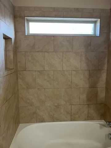 a bathroom with a bathtub