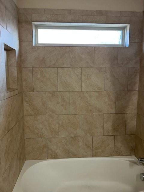 1716 Kachina Lodge Road Fort Worth, TX 76131 - Photo 14 of 21 a bathroom with a bathtub