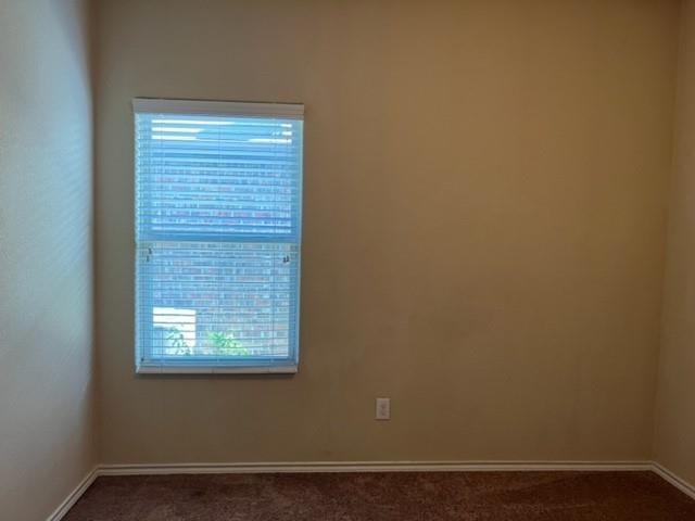 1716 Kachina Lodge Road Fort Worth, TX 76131 - Photo 17 of 21 an empty room with a window