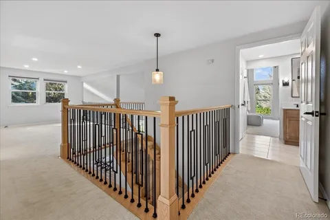 a view of a hallway with windows