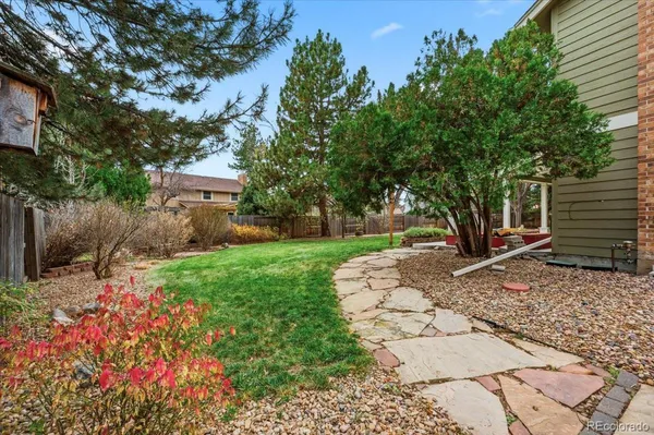 a view of a backyard with a garden