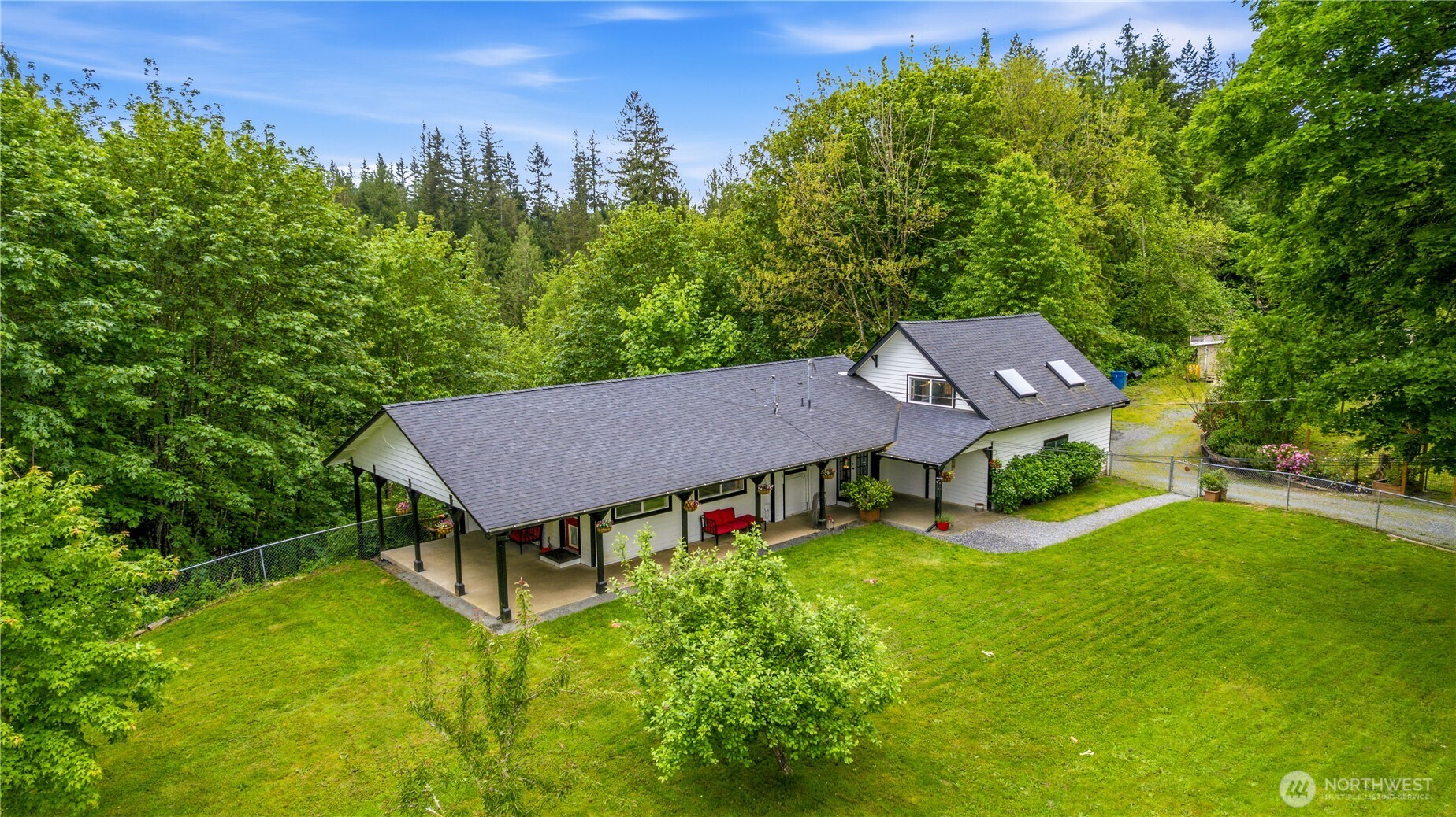 24522 Cromwell Road Monroe, WA 98272 - Photo 3 of 40 an aerial view of a house with swimming pool and garden view
