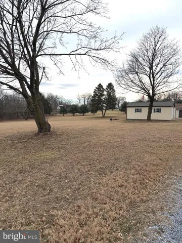 a view of outdoor space with yard