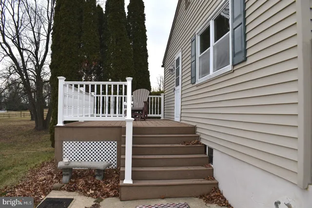 a view of stairs and wooden floor