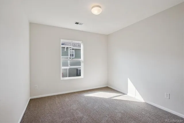 a view of a hallway with closet
