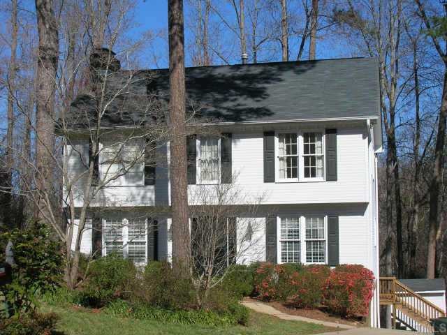 4625 Old Village Road Raleigh, NC 27612 - Photo 1 of 1 a front view of a house with a yard