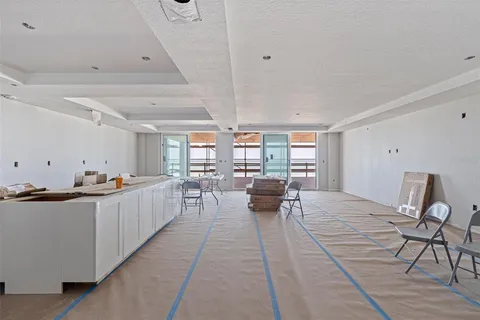 a kitchen with stainless steel appliances lots of counter top space