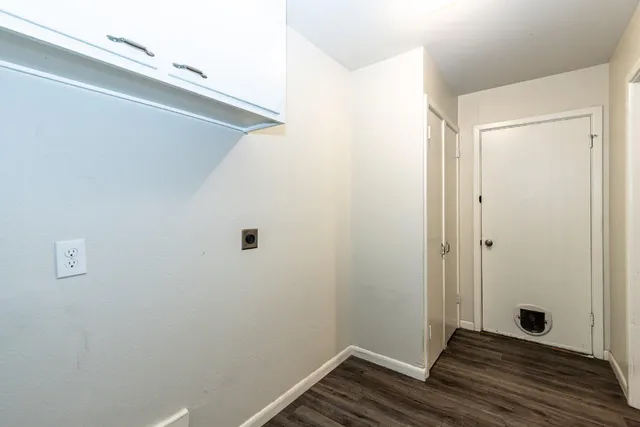 a view of small space with wooden floor