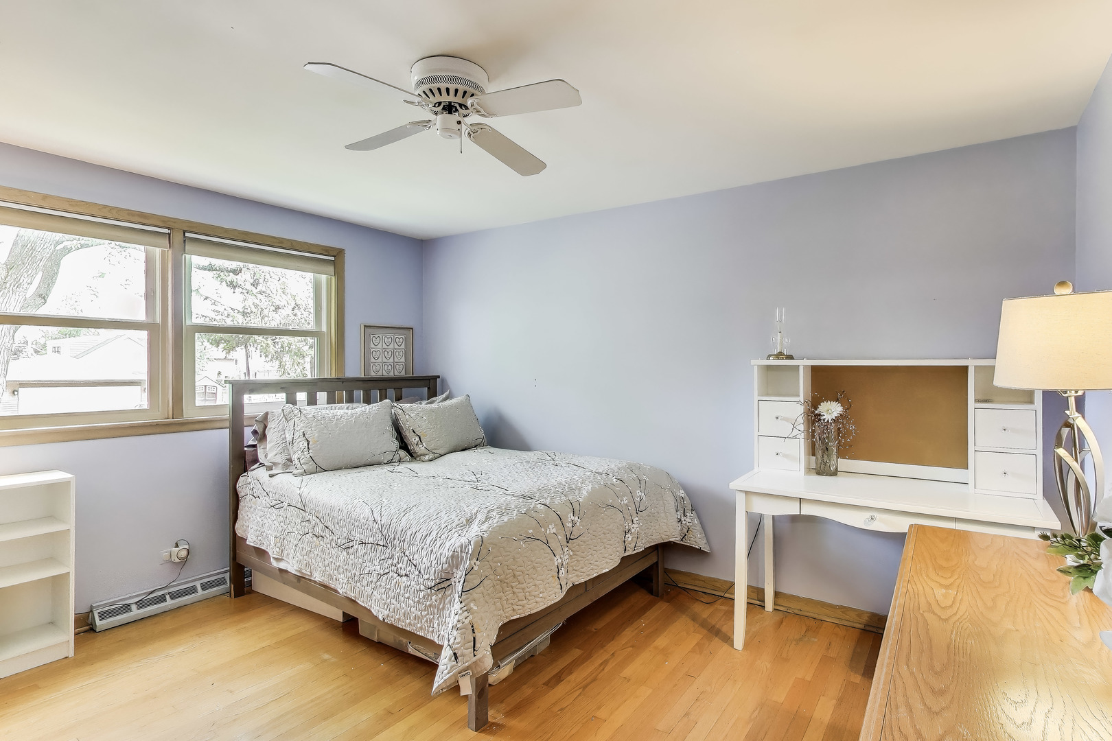 1241 Elliott Street Park Ridge, IL 60068 - Photo 7 of 14 a bedroom with a bed and a table