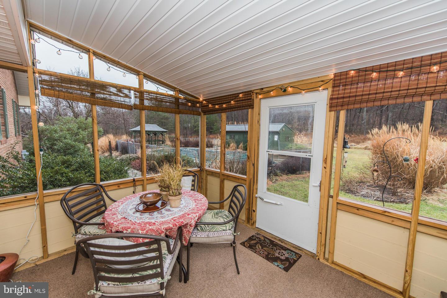 6024 Cold Run Valley Road Berkeley Springs, WV 25411 - Photo 23 of 30 Screened Porch