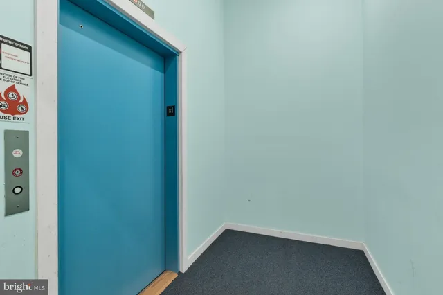 a view of a hallway with workspace