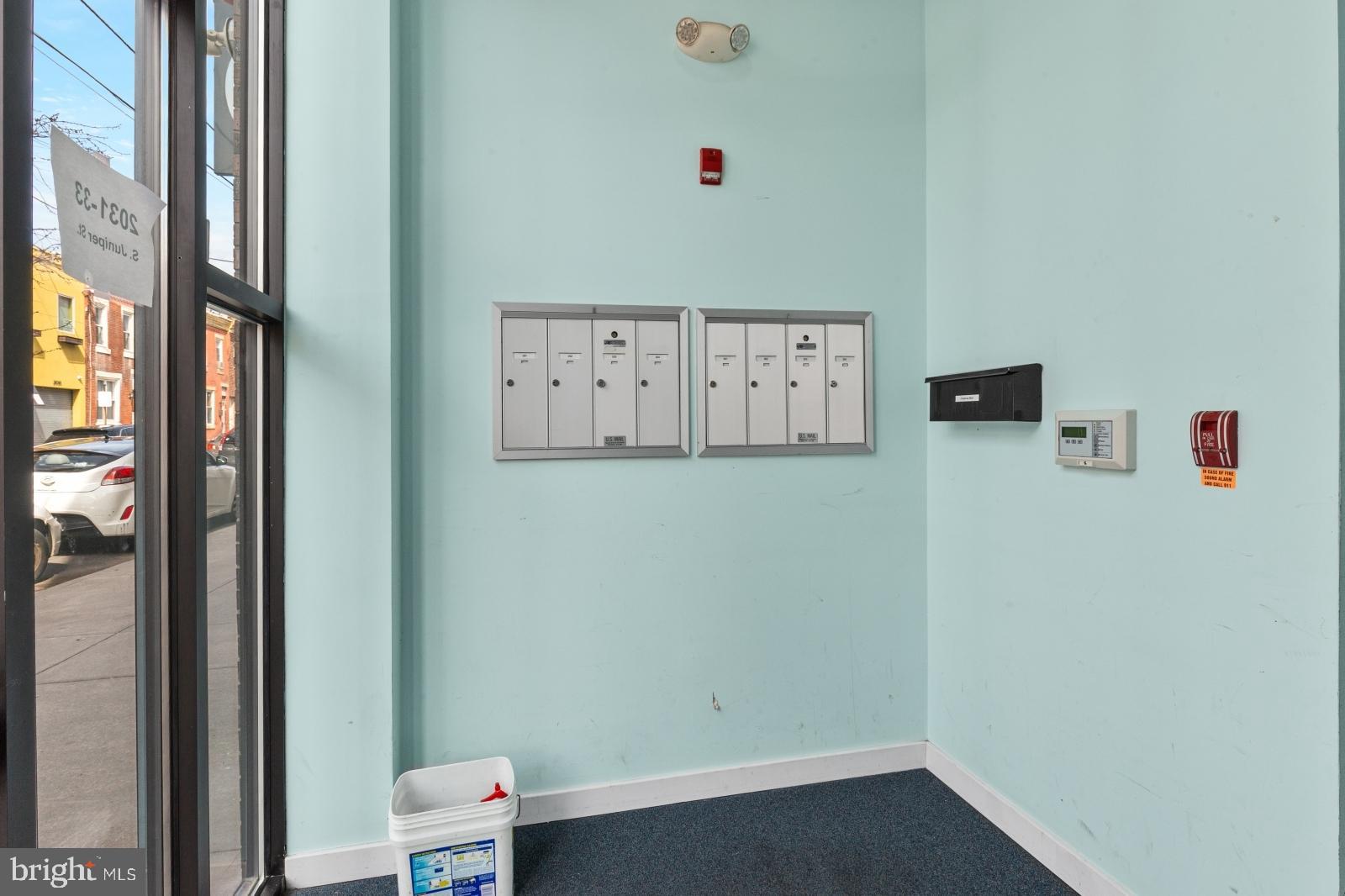 2031 South Juniper Street, Unit 204 Philadelphia, PA 19148 - Photo 29 of 31 a view of a hallway with workspace