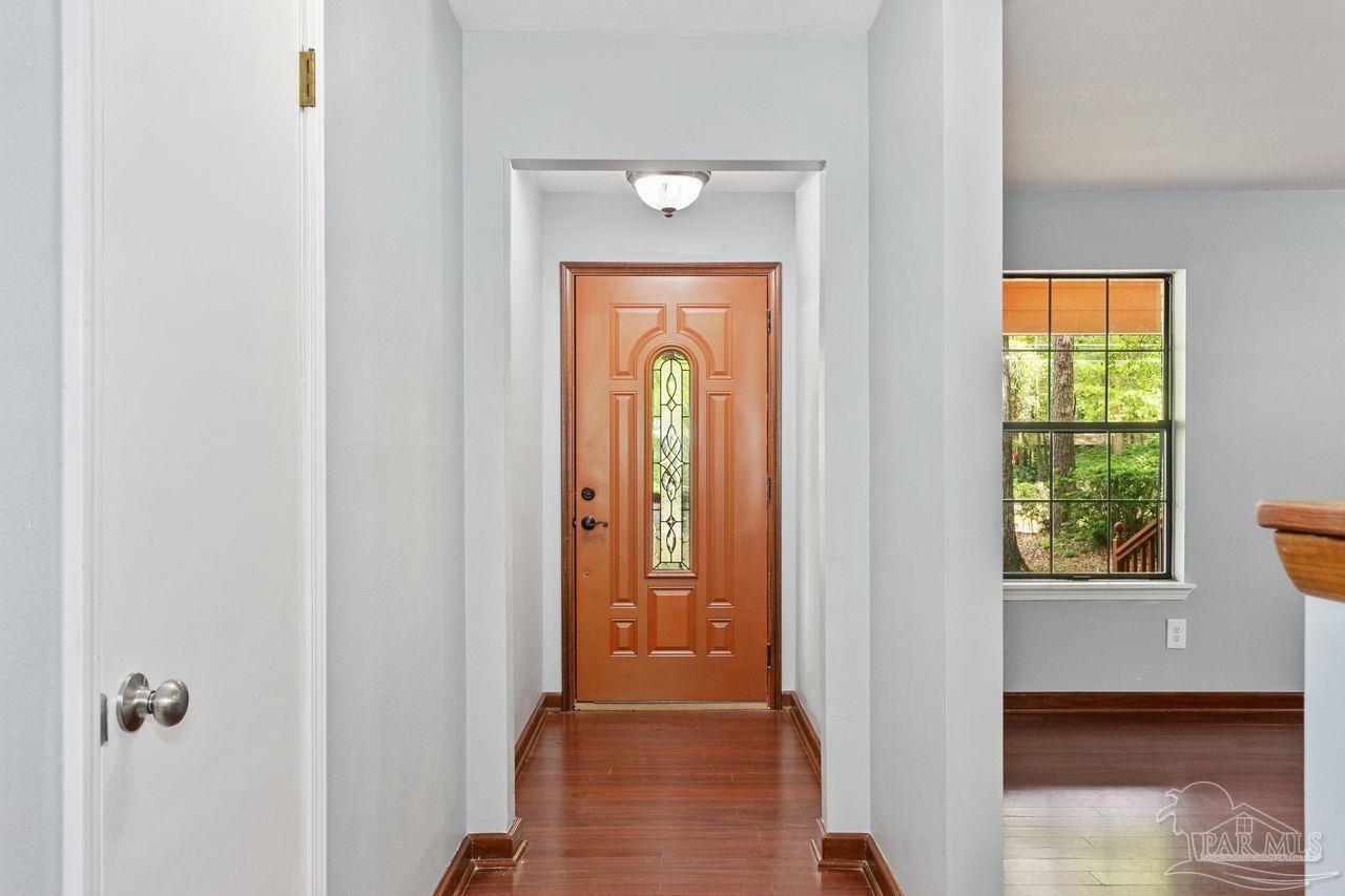 111 Cotton Creek Road McDavid, FL 32568 - Photo 6 of 37 a view of a front door of a house