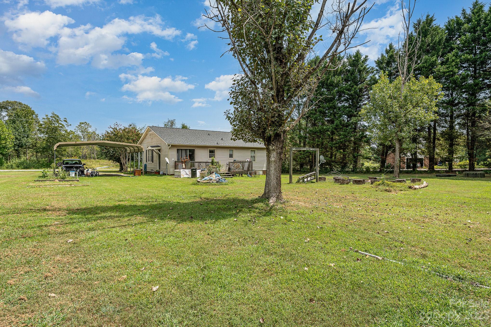2781 St James Church Road Denver, NC 28037 - Photo 21 of 22 a view of house with a big yard
