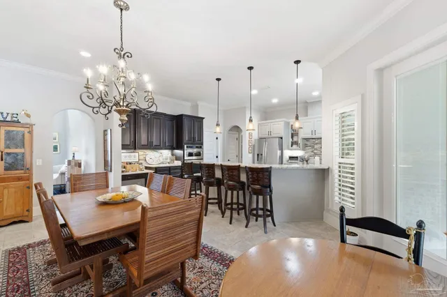 a spacious bathroom with a toilet a sink and bathtub