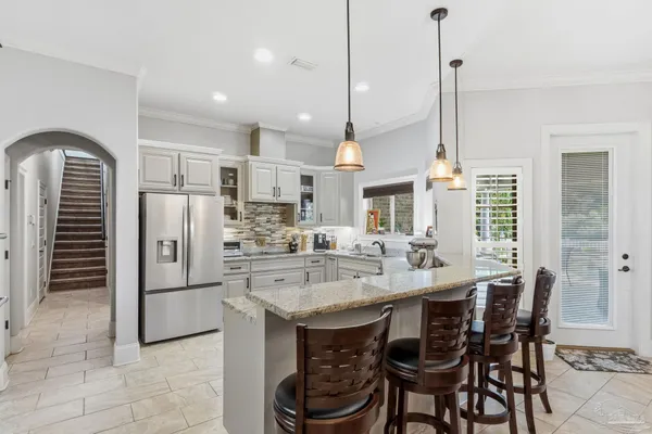 a view of a hallway with windows