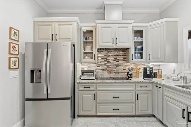 a bed room with a bed window and a television