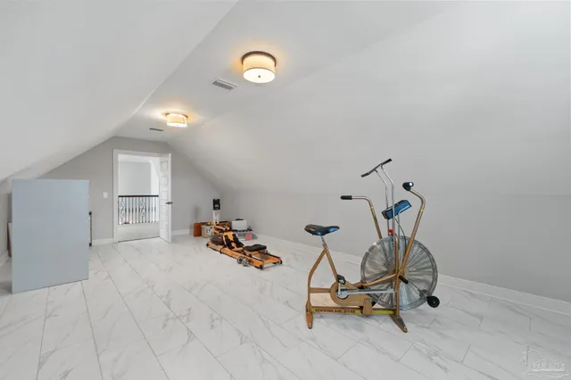 a view of a house with swimming pool and sitting area