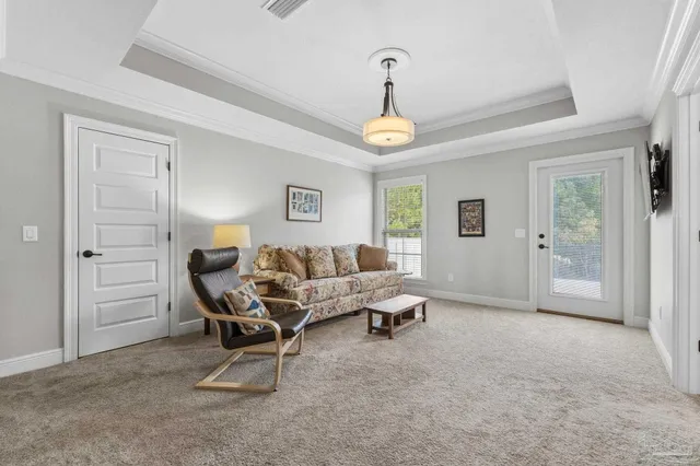 an aerial view of a residential houses with outdoor space