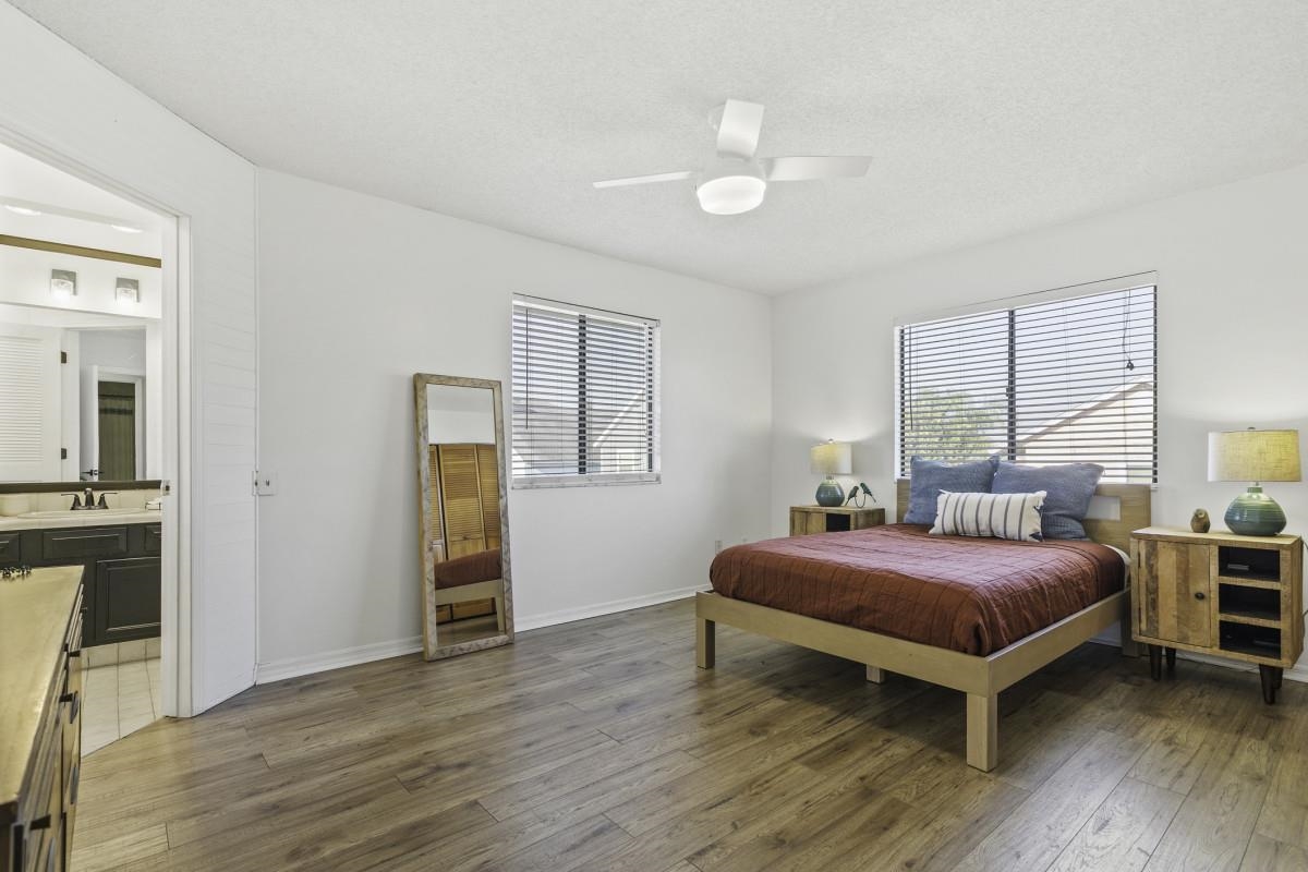 5484 5th Street St. Augustine, FL 32080 - Photo 11 of 37 a bedroom with a bed and a closet