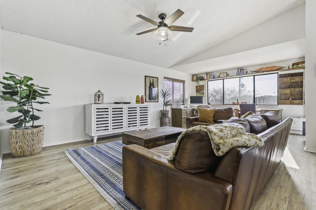 5484 5th Street St. Augustine, FL 32080 - Photo 17 of 37 a living room with furniture ceiling fan and a window