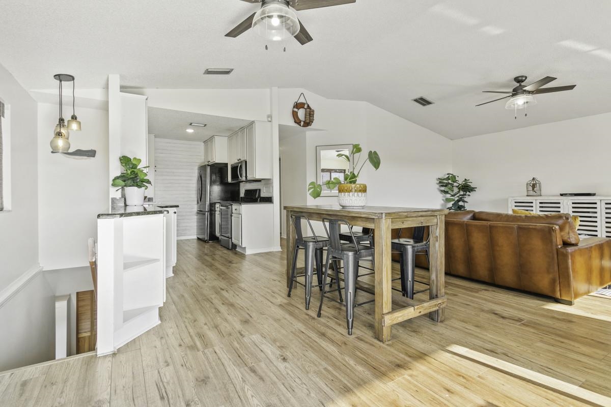 5484 5th Street St. Augustine, FL 32080 - Photo 21 of 37 a view of a kitchen and dining room