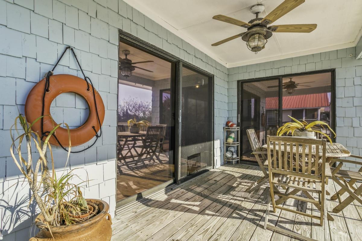 5484 5th Street St. Augustine, FL 32080 - Photo 28 of 37 a bedroom with furniture mirror and window