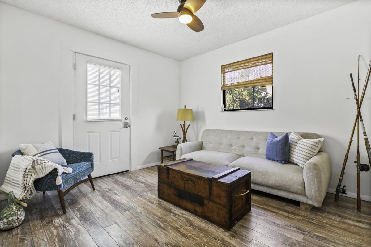 5484 5th Street St. Augustine, FL 32080 - Photo 31 of 37 a living room with furniture and a wooden floor