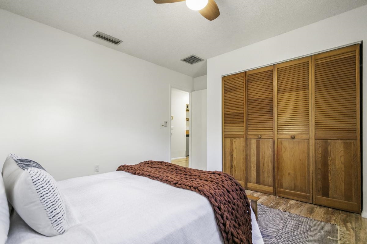 5484 5th Street St. Augustine, FL 32080 - Photo 32 of 37 a bedroom with a bed and a window