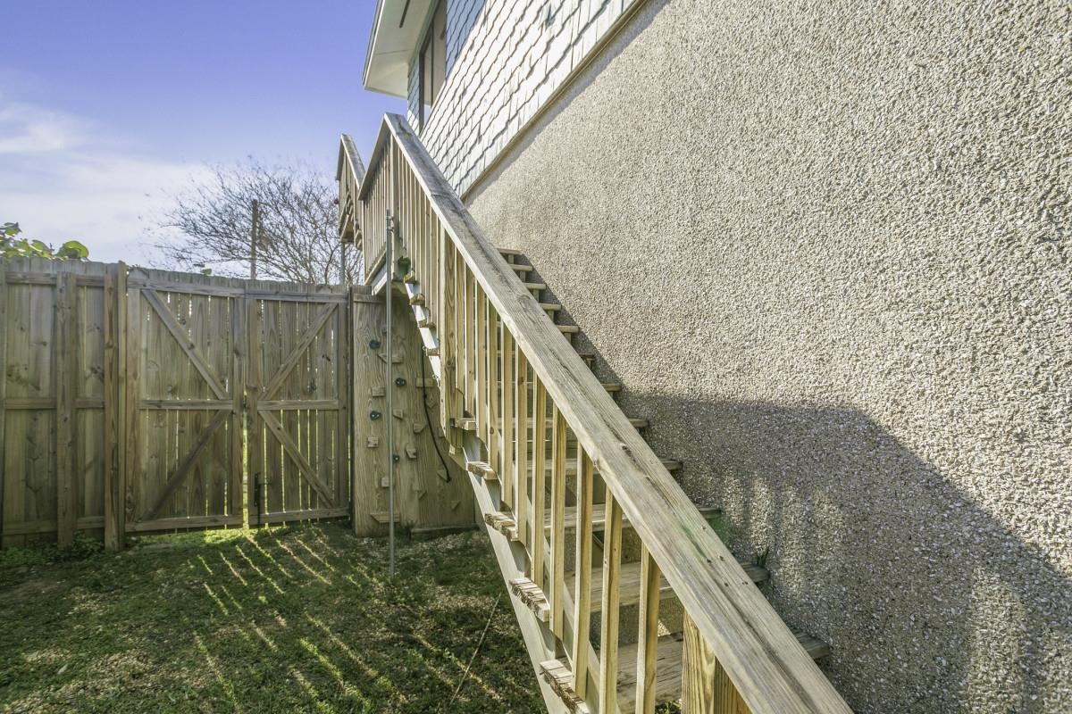 5484 5th Street St. Augustine, FL 32080 - Photo 35 of 37 a view of stairs with wooden floor and stairs