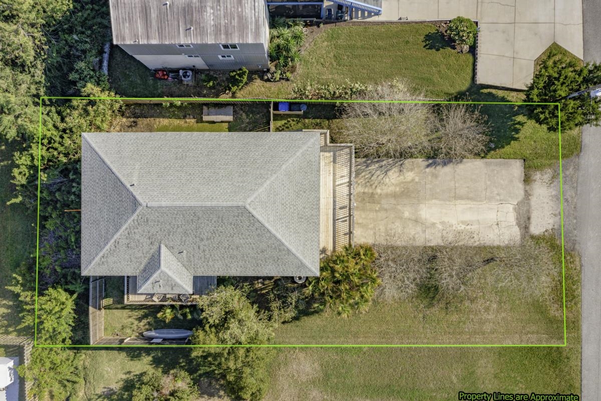5484 5th Street St. Augustine, FL 32080 - Photo 5 of 37 an aerial view of a house with a swimming pool