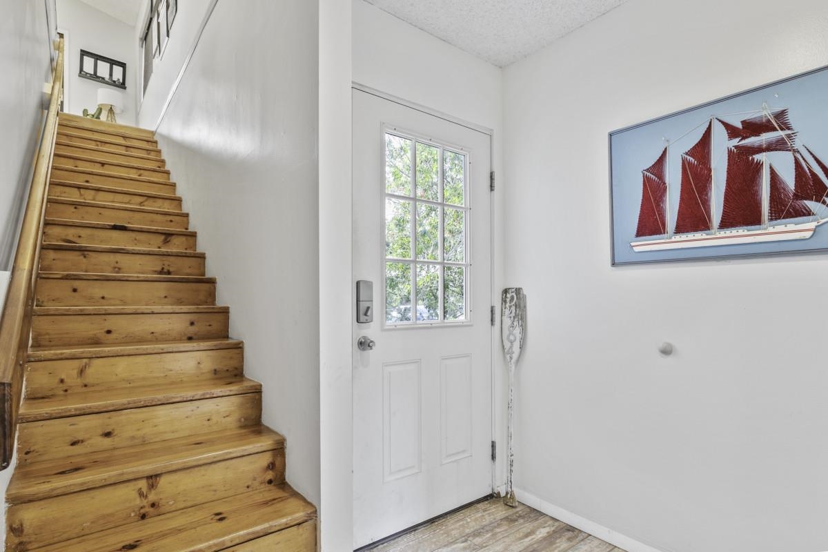 5484 5th Street St. Augustine, FL 32080 - Photo 9 of 37 a view of entryway and hall with wooden floor