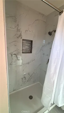 a bathroom with a toilet and a sink