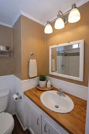 a bathroom with a shower and a shower