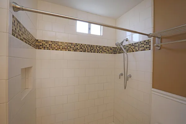 a bedroom with furniture and a chandelier