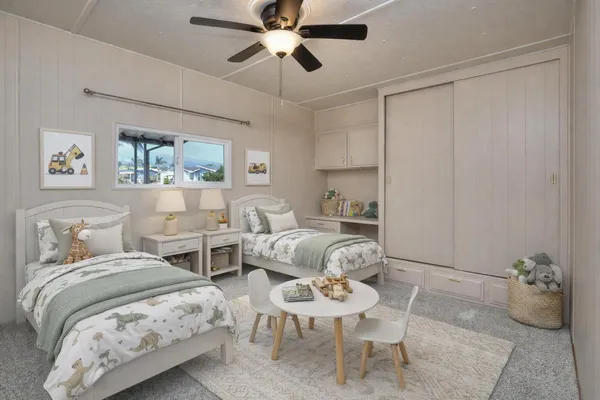 an empty room with closet and windows